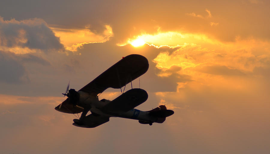 Biplane at Sunset Photograph by Bill Cannon