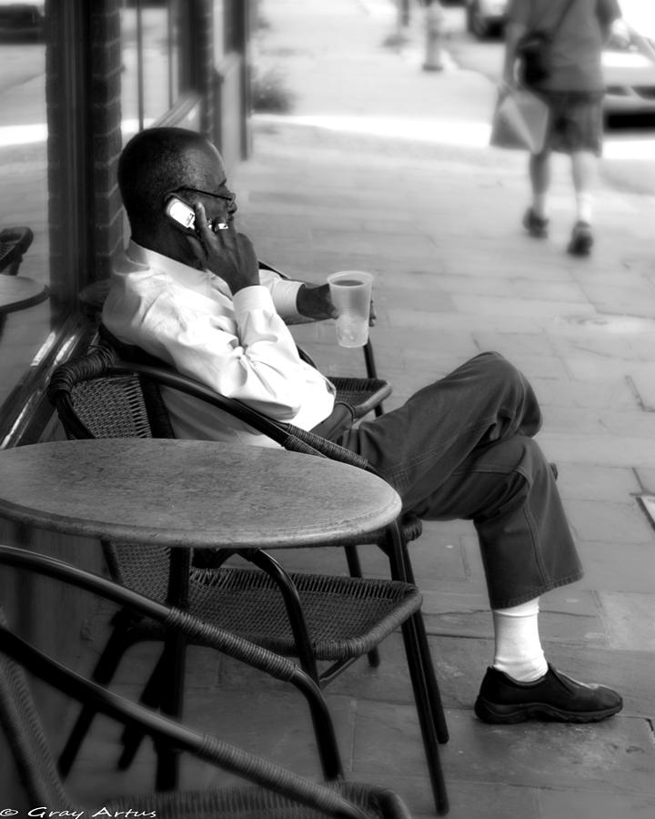 Black Man Relaxing on Sidewalks of Asheville Photograph by Gray  Artus