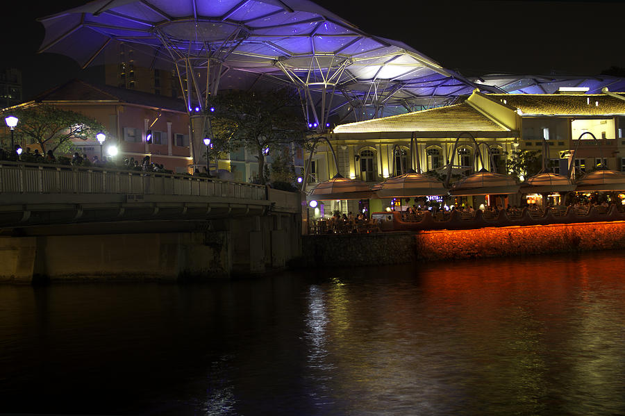 Blue canopy and river water at Clarke Quay in Singapore Photograph by Ashish Agarwal