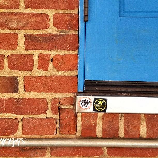 Blue Door Meets Brick Photograph by Katherine Fernandez