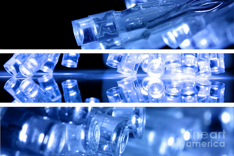 Blue led lights in three strips Photograph by Simon Bratt