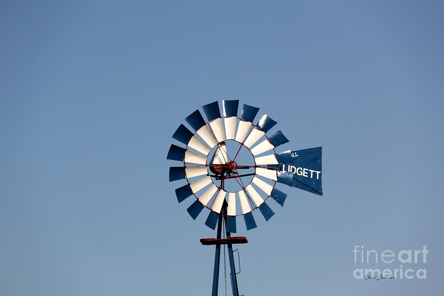 Blue windmill with blue sky Photograph by Yumi Johnson