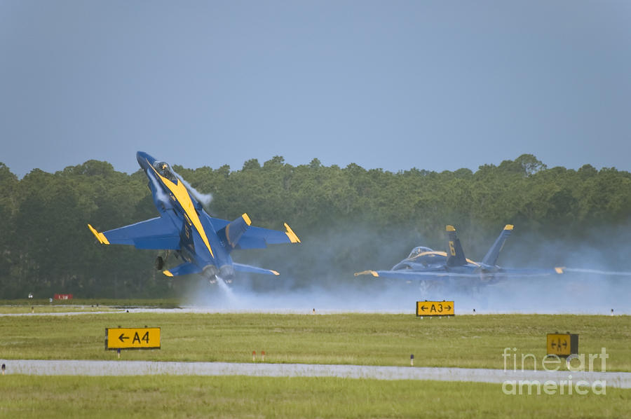 Blue Angels Photograph - Blues Solo Takeoff by Tim Mulina