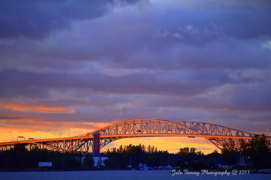 Bluewater Bridge On a Stormy Sunset Photograph by Jale Fancey