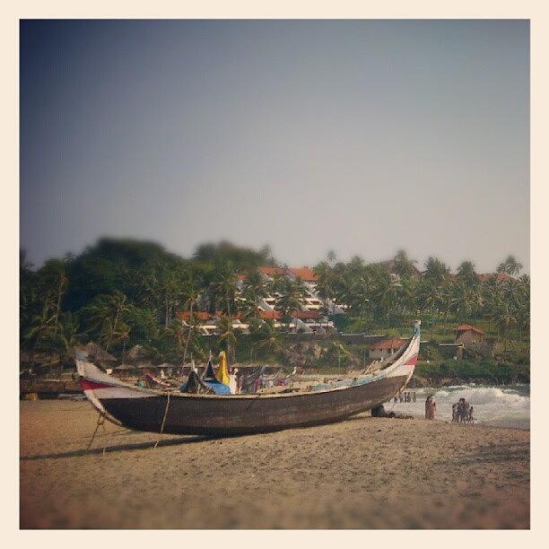 Summer Photograph - Boat By Kovalam Beach, Trivandrum by Dahlia Ambrose