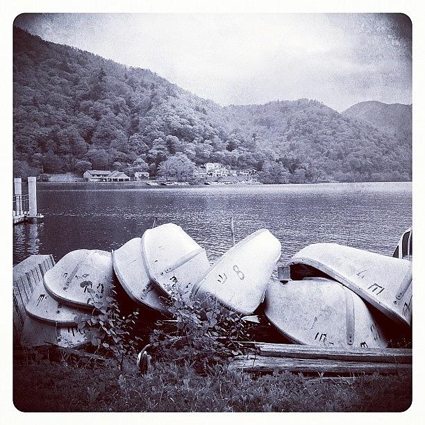 Black And White Photograph - Boats By Lake Chuzenji by Marc Gascoigne