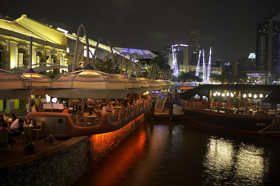 Boats moored on water at Clarke Quay in Singapore  Photograph by Ashish Agarwal