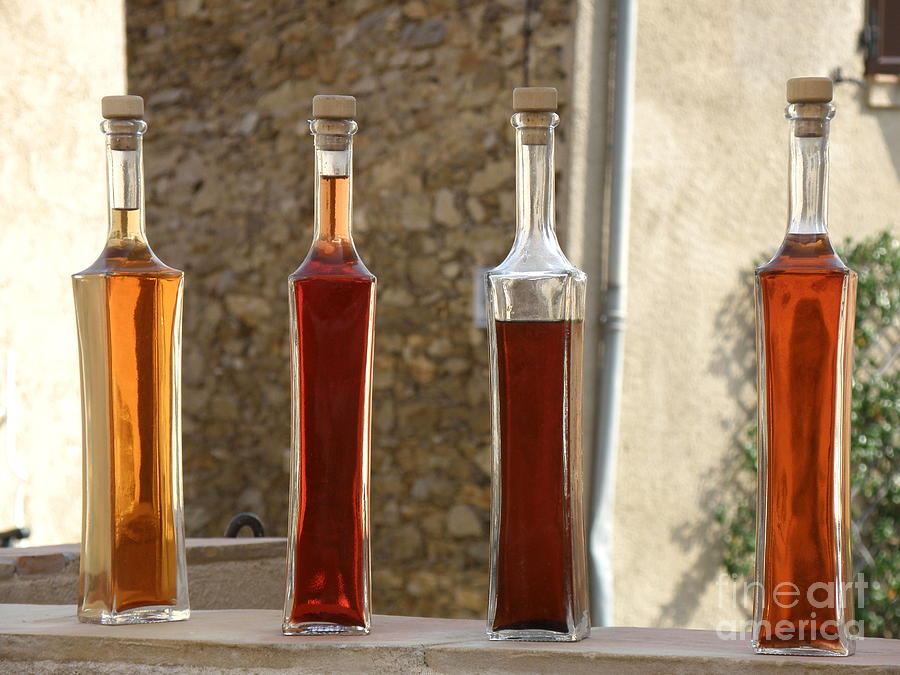 Bottles of Vinegar Photograph by Lainie Wrightson