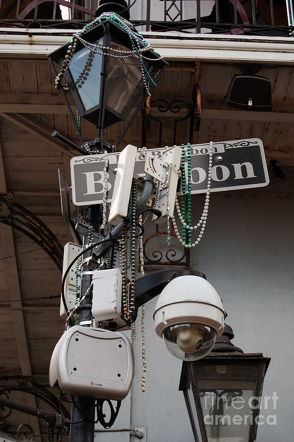 Bourbon Street Sign and Lamp Covered in Beads Photograph by Shawn OBrien