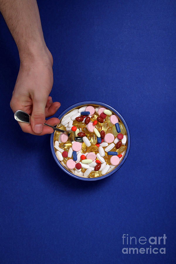 Bowl Of Pills Photograph by Photo Researchers