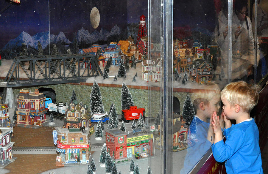 Boy and Christmas Trains Photograph by Diane Lent
