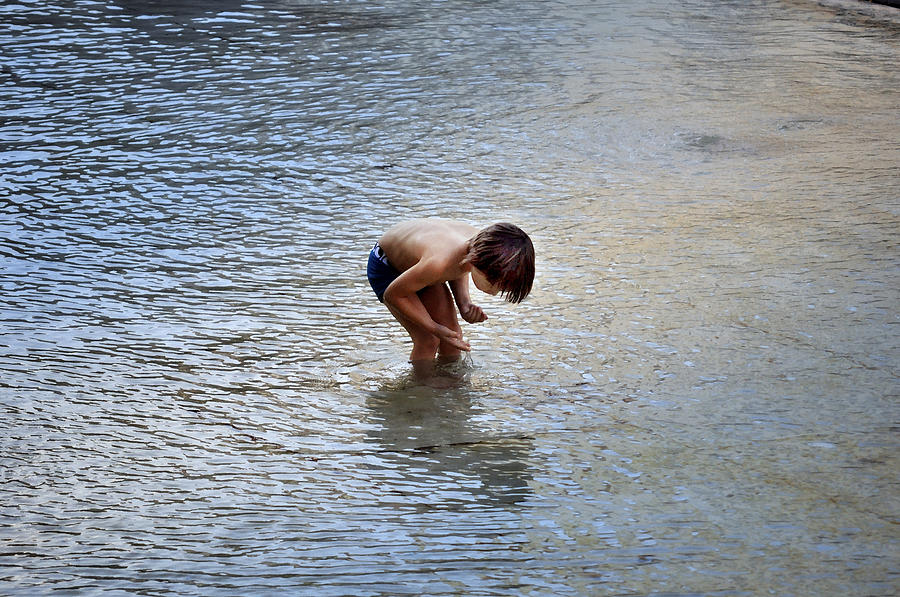 Boy Playing in the Pond Photograph by Mary Machare