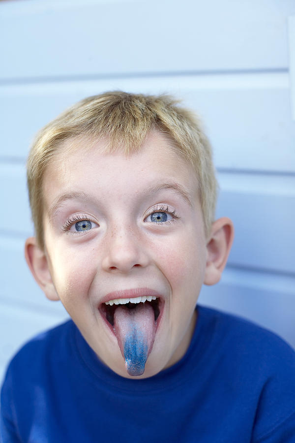 Boy With A Blue Tongue Photograph by Ian Boddy - Pixels