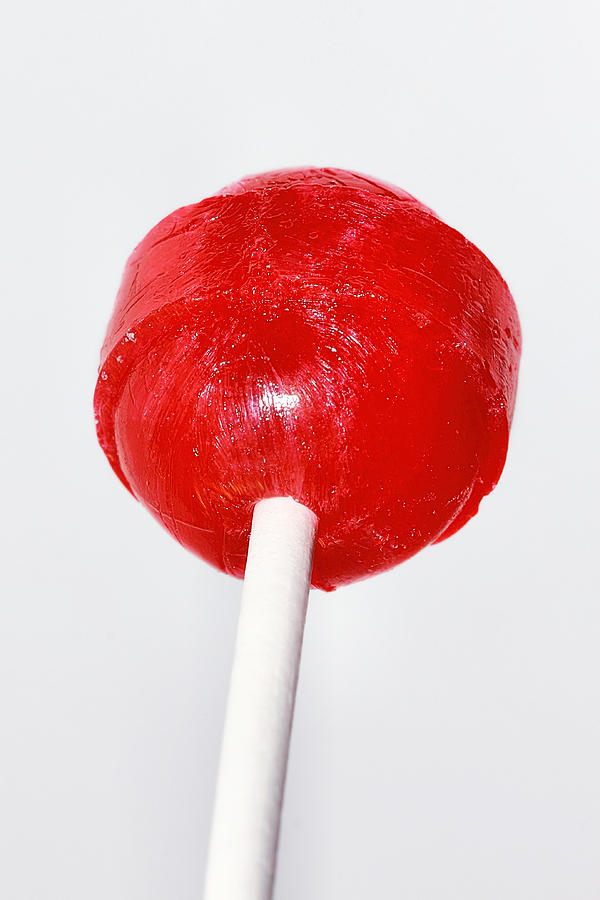 Bright Red Lollypop Candy Photograph by Tracie Schiebel