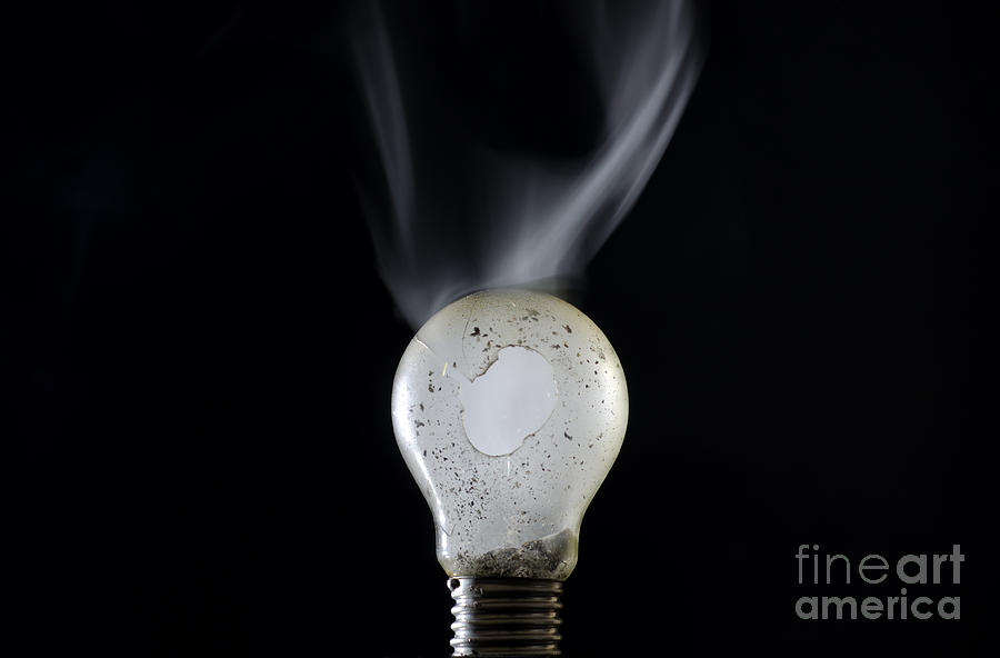 Broken lamp bulb Photograph by Mats Silvan
