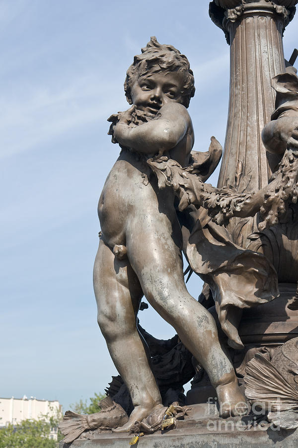 Bronze amorino on the bridge Alexandre III in Paris Photograph by Fabrizio Ruggeri
