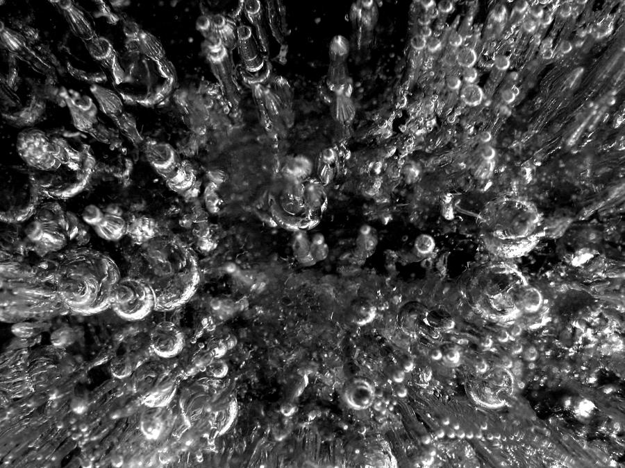 Bubble towers trapped in ice macro image Photograph by Adam Long