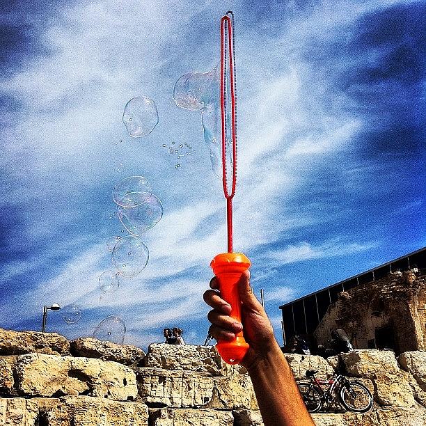 People Photograph - #bubbles #red #clouds #sky #happy by Alon Ben Levy