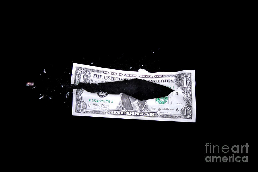 Bullet Hitting A Dollar Bill Photograph by Ted Kinsman