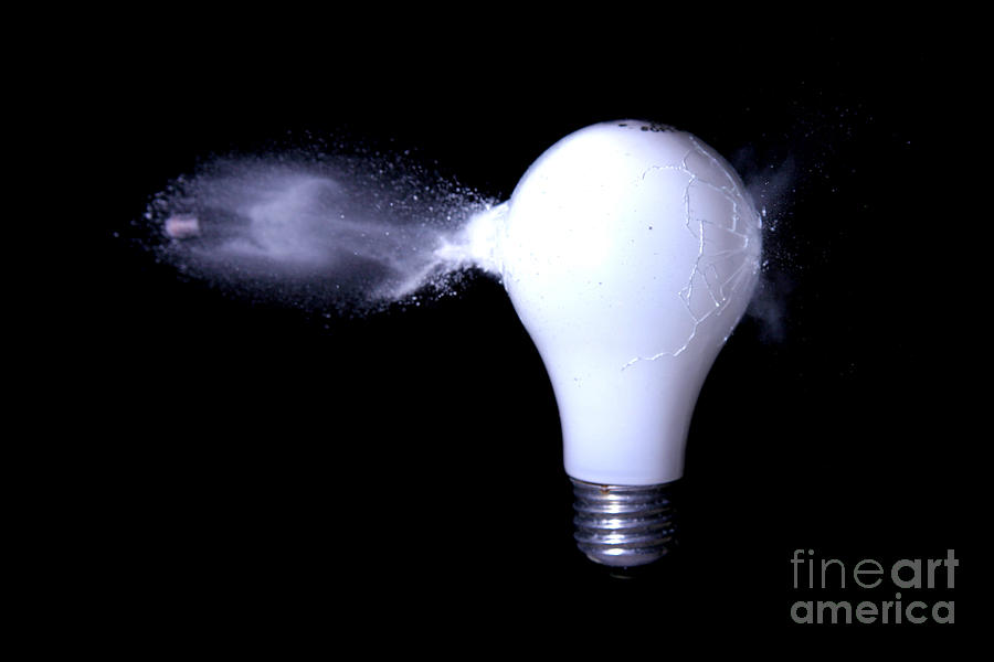 Bullet Hitting A Lightbulb  by Ted Kinsman