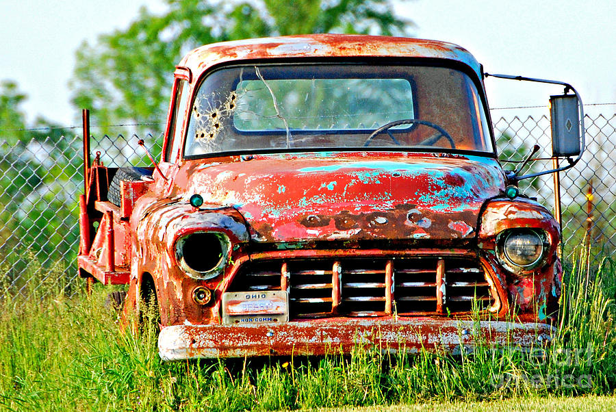 Bullet Hole Forgotten Truck Photograph by Lila Fisher-Wenzel