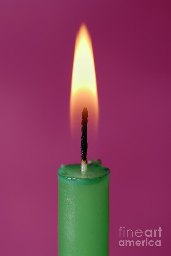 Burning candle Photograph by Sami Sarkis