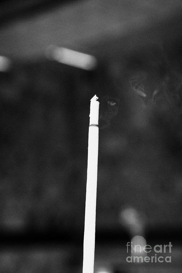 Hong Kong Photograph - Burning Incense Joss Stick In Columbarium Po Fook Hill Cemetery Sha Tin New Territories by Joe Fox