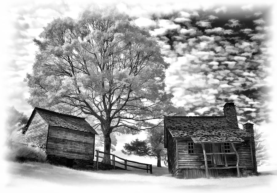 Cabin Under Buttermilk Skies vignette Photograph by Dan Carmichael
