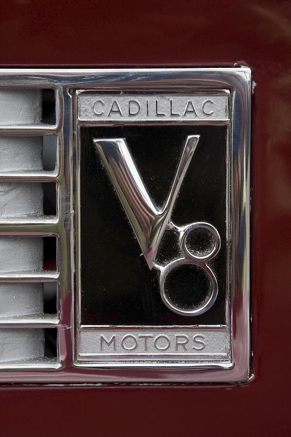 Cadillac Emblem Photograph by Sally Weigand