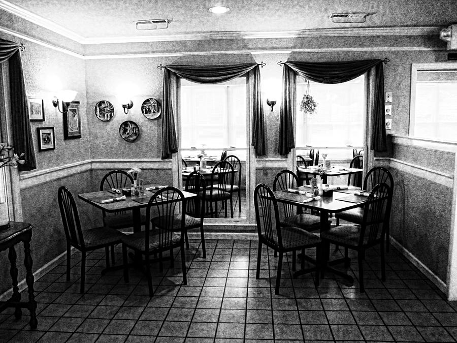 Cafe At Night - Quiet Delight - In Black and White Photograph by Kathy Clark