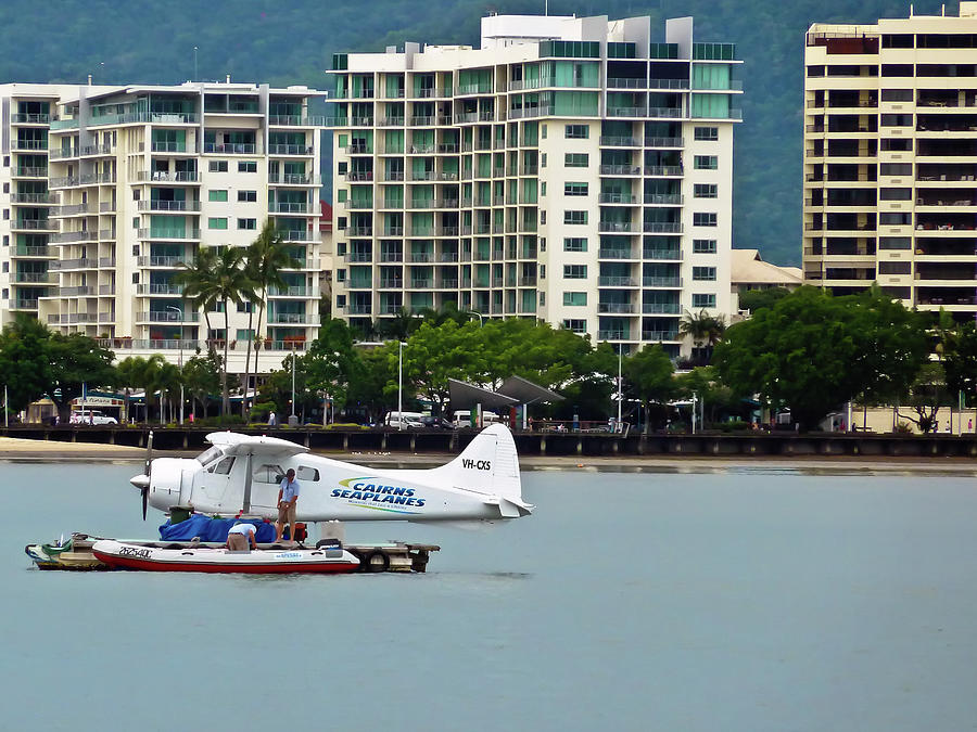 Cairns Skyline with Seaplane Photograph by Harry Strharsky
