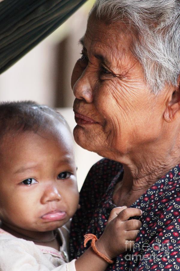 Cambodian Grandmother And Baby #1 Photograph by Nola Lee Kelsey