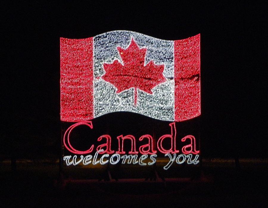 Canada Welcomes You - Canada Flag Photograph by Peggy King