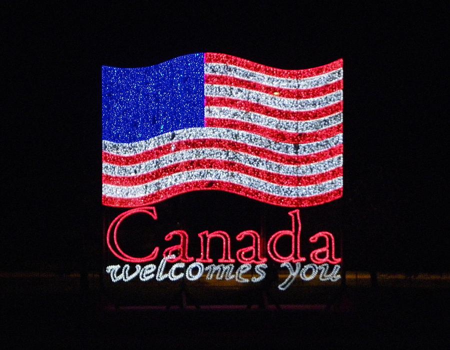 Canada Welcomes You - US Flag Photograph by Peggy King