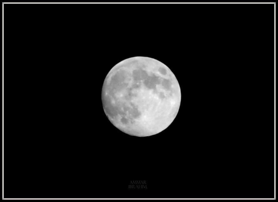 Moon Photograph - Canadian moon by Ammar Ibrahim