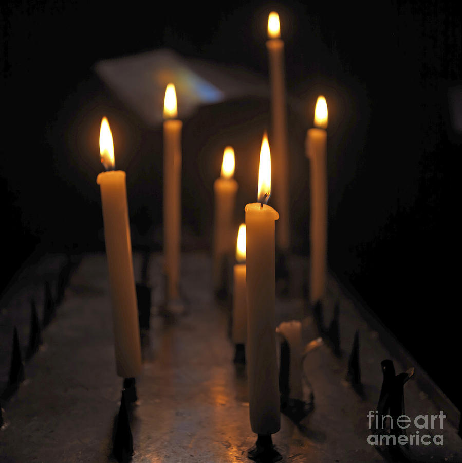 Candle Photograph - Candles burning in a church by Bernard Jaubert