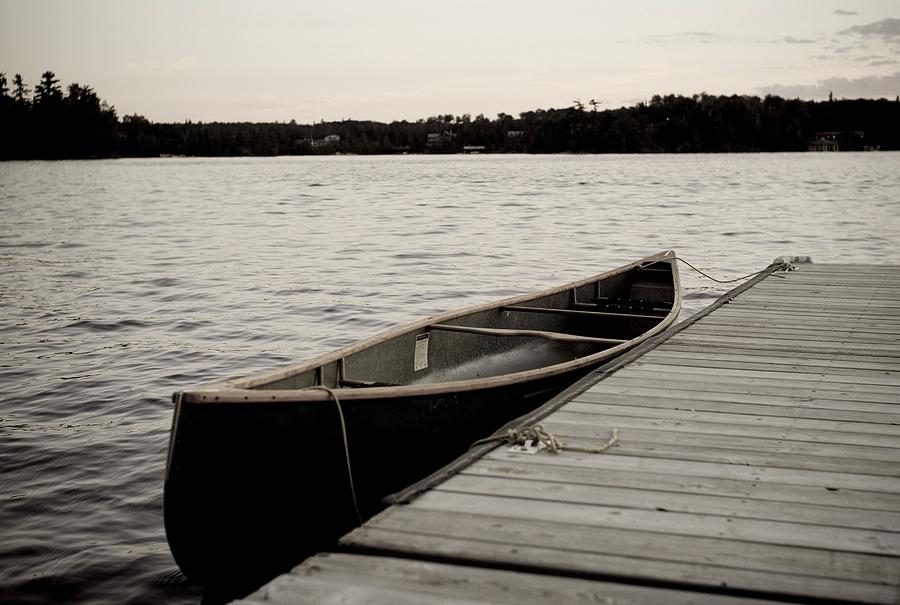 Canoe At Dock, Lake Of The Woods Photograph by Keith Levit