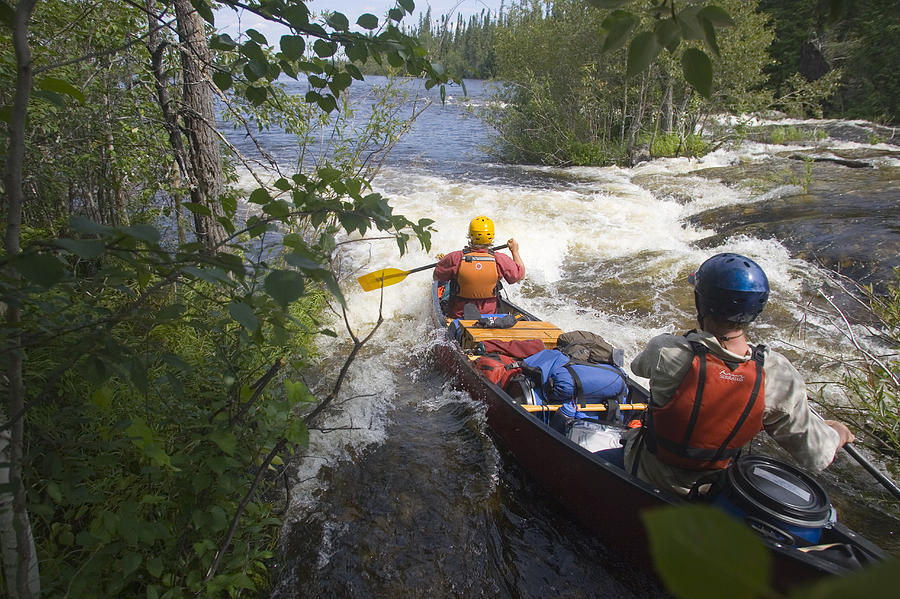 Canoeists Run A Rapid On The Winisk Photograph by Skip Brown