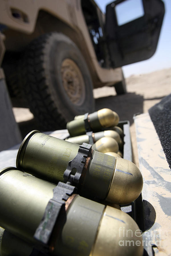 Truck Photograph - Cans Of Opened 40 Mm Grenades by Stocktrek Images