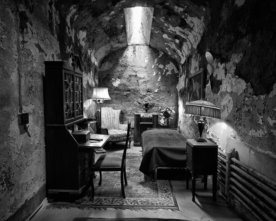 Black And White Photograph - Capones Cell by Darren Creighton