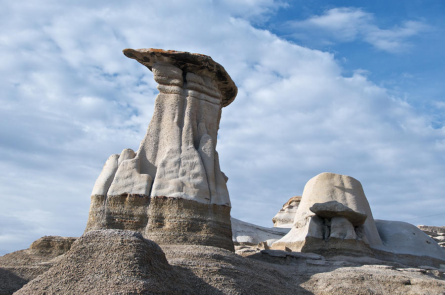 Capped Hoodoo And Clouds Photograph by David Kleinsasser