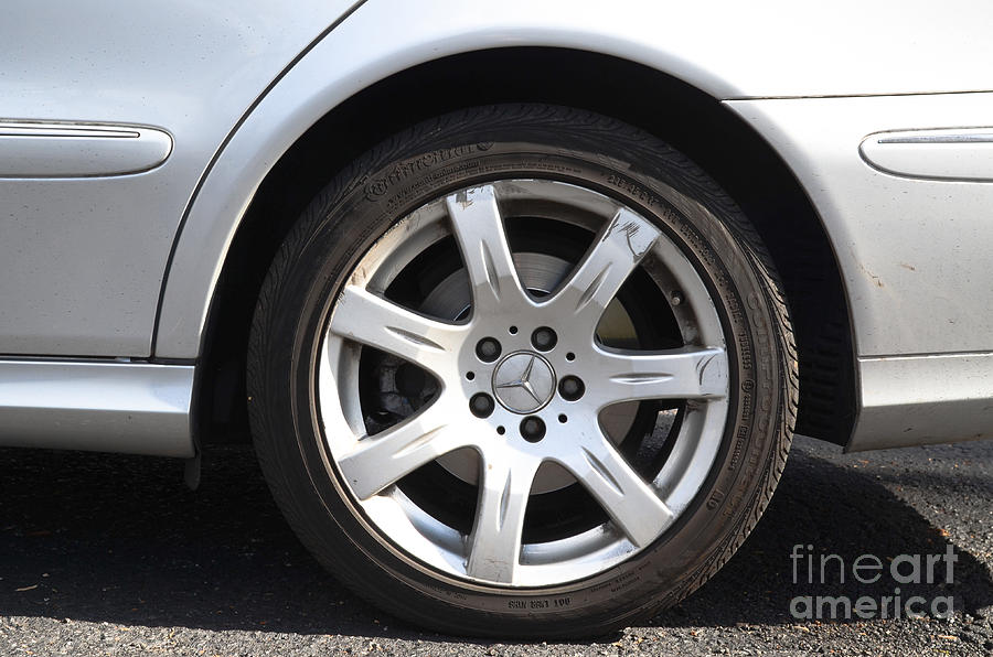 Car Wheel Photograph by Photo Researchers