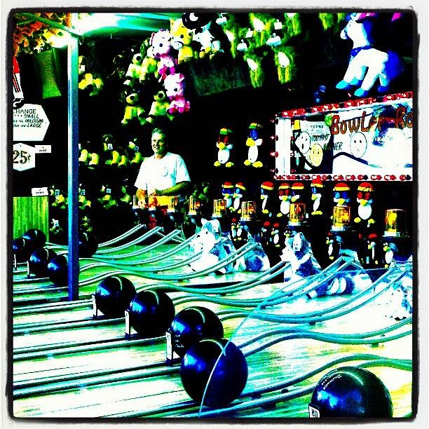 Abstract Photograph - Carnival Bowling Game Carny At The Fair by Marianne Dow