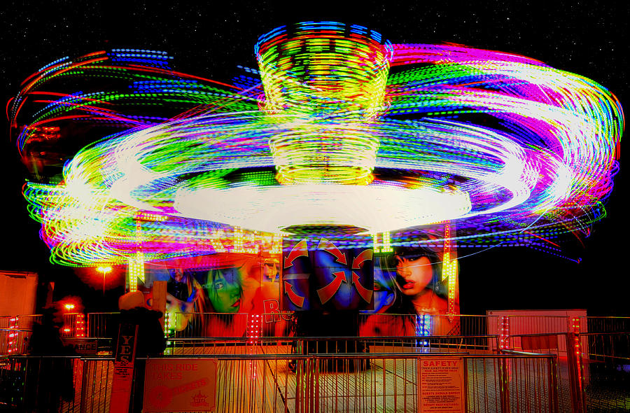 Carnival Twirl Photograph by Joann Vitali