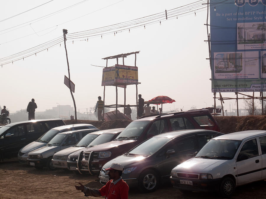 Cars in a parking lot at Surajkund Photograph by Ashish Agarwal