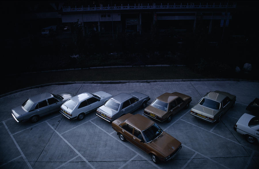 Cars In Hong Kong Photograph by Shaun Higson