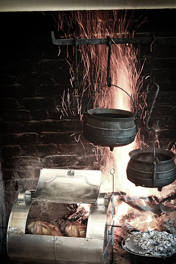 Cauldrons on the fire Photograph by Emanuel Tanjala