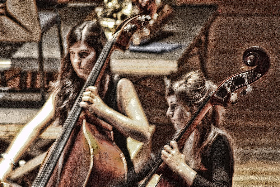 Cellist Photograph by Angel Jesus De la Fuente