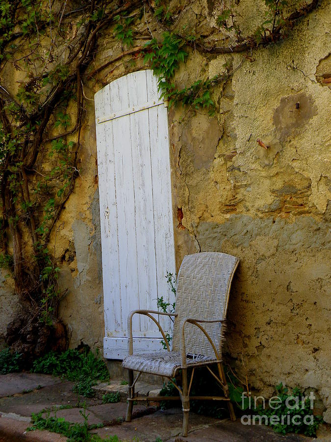 Chair by the White Door Photograph by Lainie Wrightson