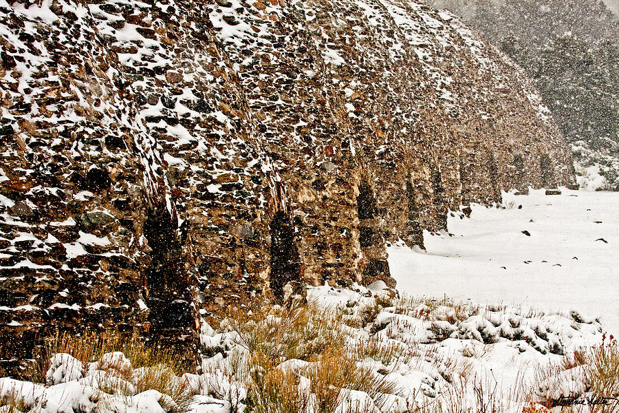 Death Valley Kilns During April Snowstorm Photograph by Stephanie Salter